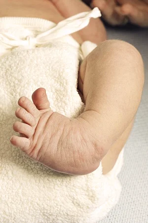 Close-up of newborn baby's foot